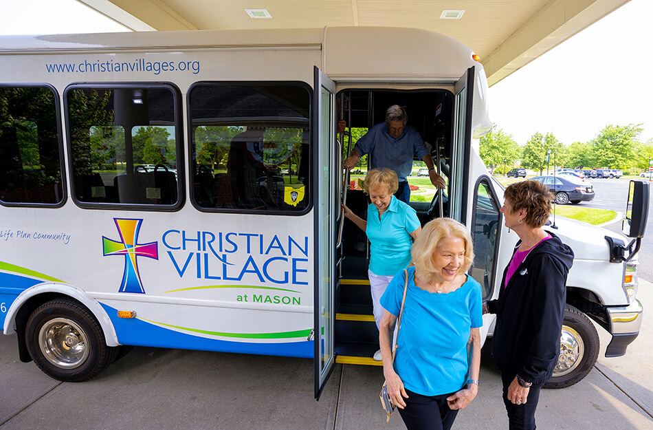 Seniors exit Christian Village Bus