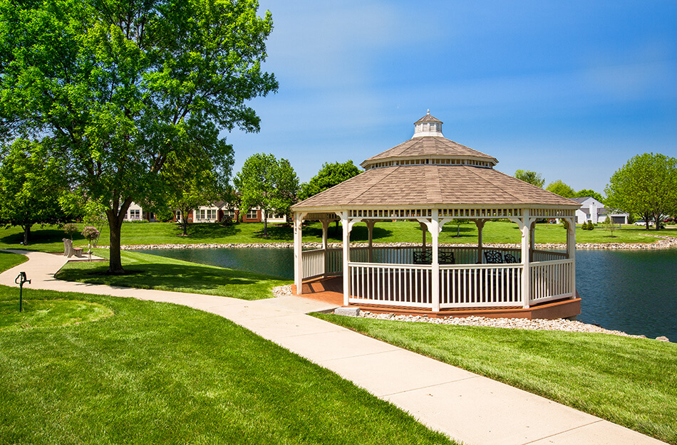 Gazebo on walking path around pond