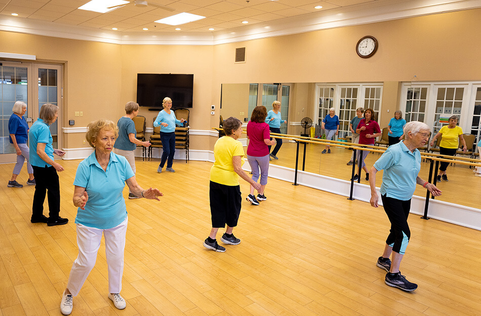 Seniors exercising in a class