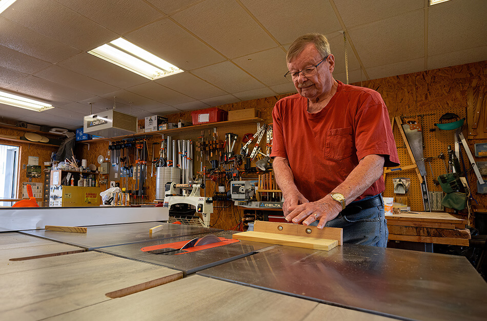 Man woodworking in a shop